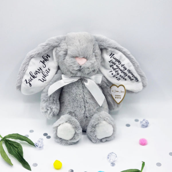 Super cute fluffy grey teddy bunny with white inner ears and black vinyl personalisation saying Naming Day Ceremony with name and date