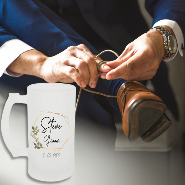 Groom tying his lace with personalised beer stein in front of him