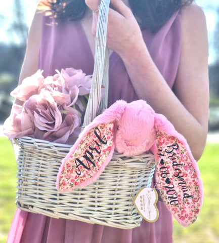 Bridesmaid holding basket with pink fluffy bunny with black vinyl personalisation in ears