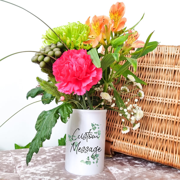 White Vase with flowers in. Design on the front with custom printed message 